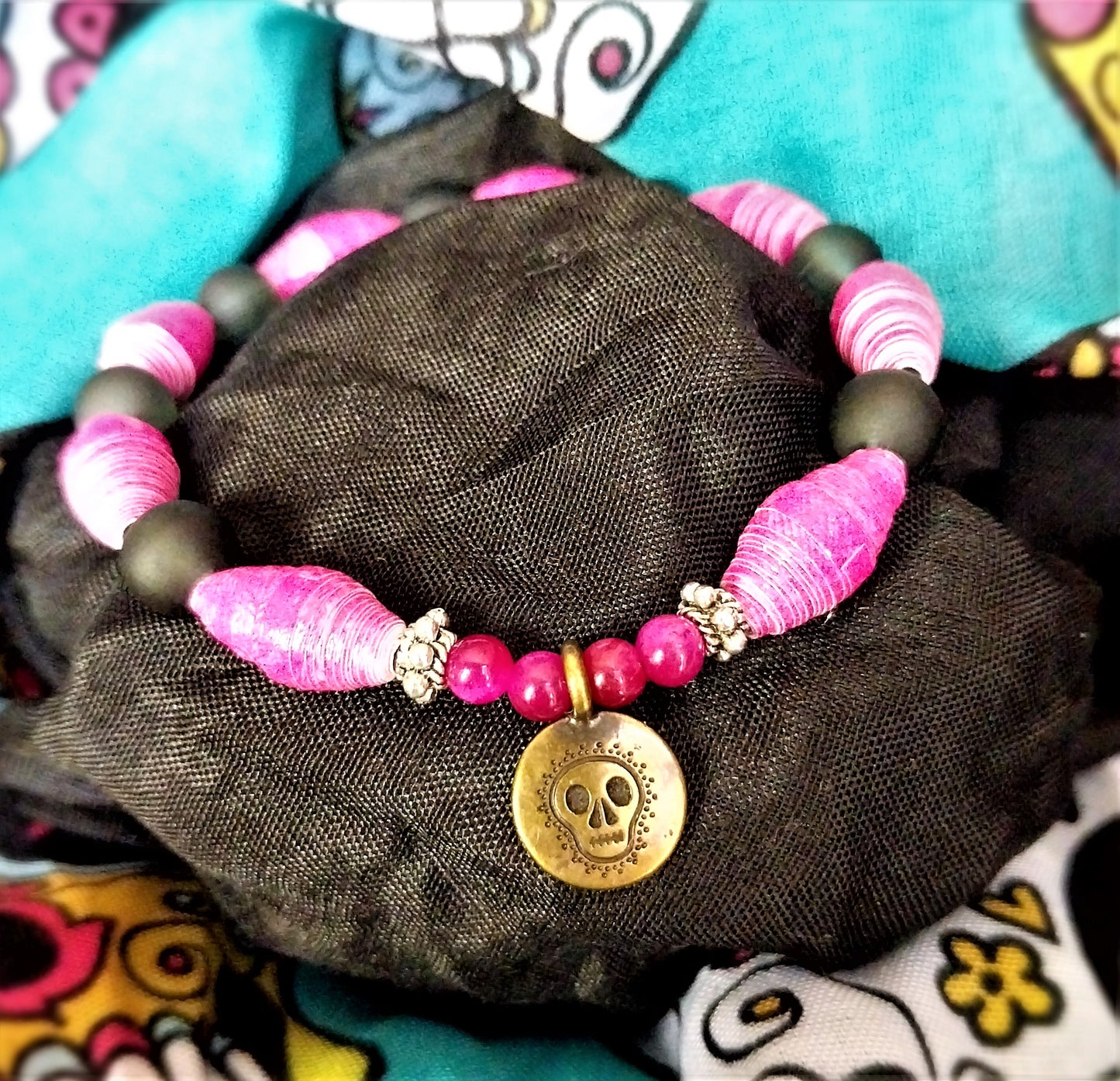 Bracelet With Dia De Los Muertos Skull, Pink Handmade Paper Beads & Frosted Beads