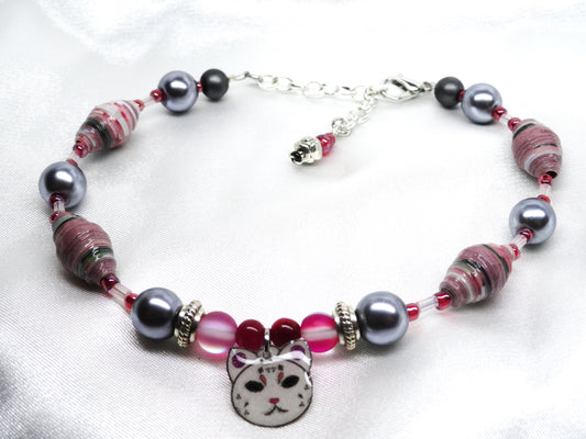 Adjustable Nietas Cat Logo Bracelet With Colorful Handmade Paper Beads, and Silver Glass Beads